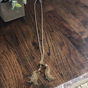 Long knotted necklace with tassels